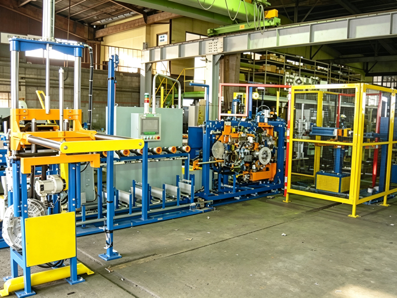 Dual-station vertical lamination apex production line